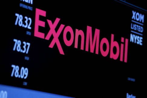 By Sabrina Valle HOUSTON (Reuters) - Exxon Mobil's investors now prefer the company use its share price and financial might to acquire existing oil and gas production rather than spend on drilling
