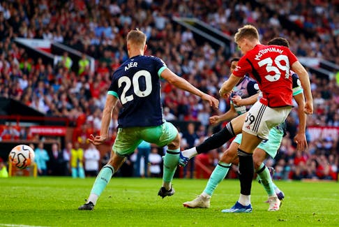 By Peter Hall BURNLEY, England (Reuters) - Manchester United needed two stoppage-time goals from Scott McTominay to secure a dramatic 2-1 win over Brentford as Tottenham Hotspur went top of the