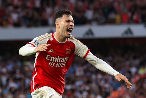 By Peter Hall LONDON (Reuters) - Substitute Gabriel Martinelli fired a last-gasp winner to hand Arsenal a 1-0 victory over Manchester City on Sunday, a result that moves Mikel Arteta's side level on