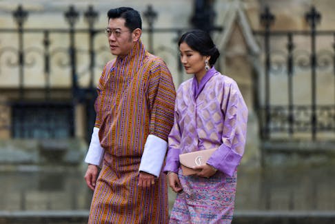 Bhutan's King Jigme Khesar Namgyel Wangchuck and Queen Jetsun Pema arrive to attend Britain's King Charles and Queen Camilla's coronation ceremony at Westminster Abbey, in London, Britain May 6, 2023.