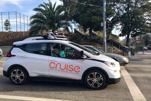 A Cruise self-driving car, which is owned by General Motors Corp, is seen outside the company?s headquarters in San Francisco, California, U.S., September 26, 2018.