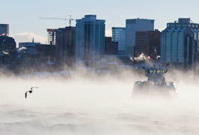 Very cold weather. A Halifax ferry emerges through surface fog on Halifax harbour on its route to Dartmouth. Temperatures were in the minus teens and much colder when wind chill was accounted for.