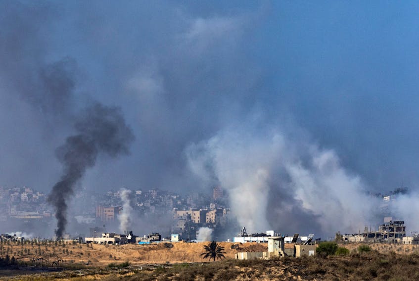 Smoke rises over Gaza as seen from Southern Israel, amid the ongoing conflict between Israel and Palestinian group Hamas, November 10, 2023.