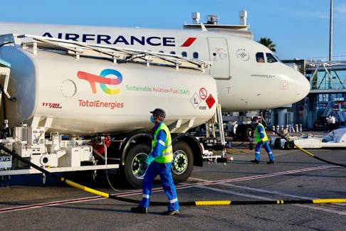 An Air France aircraft, operated with sustainable aviation fuel (SAF) produced by TotalEnergies, is refueled before its first flight from Nice to Paris at Nice airport, France, October 1, 2021.