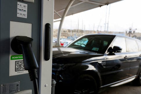 A view of an electric vehicle plugged into a public charging station in Ta' Xbiex, Malta November 9, 2023.