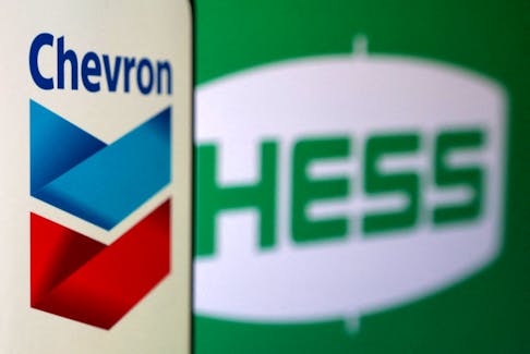 Chevron and Hess logos are seen in this illustration taken, October 23, 2023.
