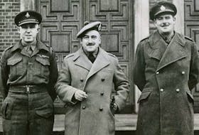 The three central figures in the trial of SS-Waffen General Kurt Meyer in December 1945, were Lt-Col. Clarence S. Campbell (later NHL president), left, Lt.-Col. Bruce J.S. Macdonald and Lt.-Col. Dalton Dean. Windsor Star. Public Domain.