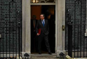 British Foreign Secretary David Cameron leaves 10 Downing St., in central London, after attending a cabinet meeting, on Tuesday.