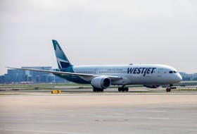 A WestJet Boeing 787-9 Dreamliner airplane taxis along a runway at Toronto Pearson Airport in Mississauga, Ontario, Canada April 28, 2021.
