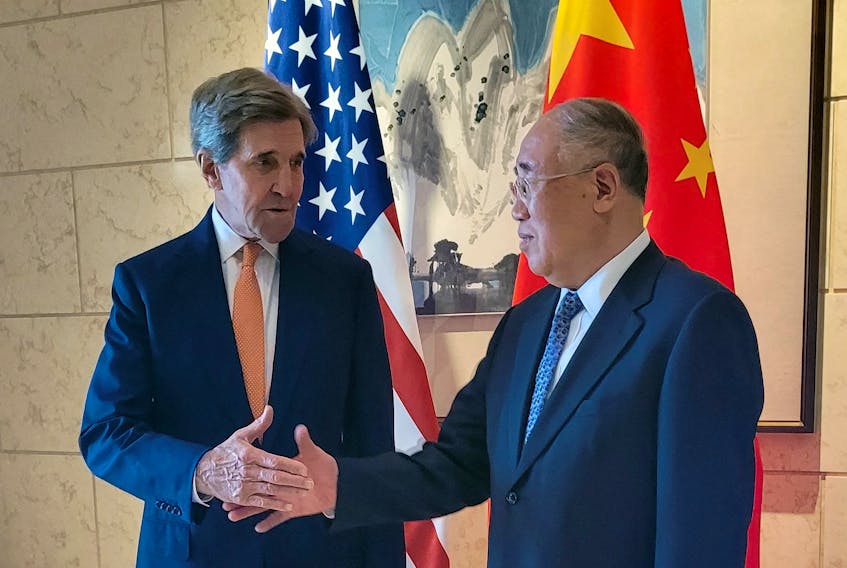 U.S. Special Presidential Envoy for Climate John Kerry shakes hands with his Chinese counterpart Xie Zhenhua before a meeting in Beijing, China July 17, 2023.