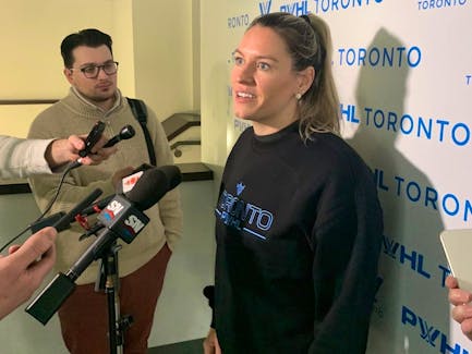 Toronto PWHL player Natalie Spooner speaks with media members.
