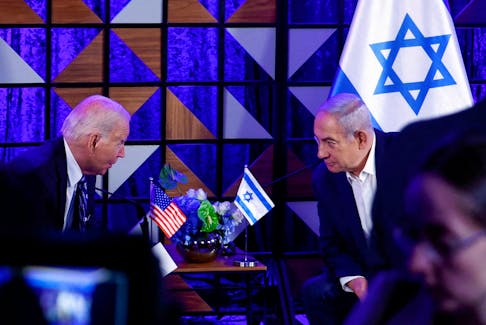 Biden attends a meeting with Israeli Prime Minister Benjamin Netanyahu, as he visits Israel amid the ongoing conflict between Israel and Hamas, in Tel Aviv, Israel, October 18, 2023.