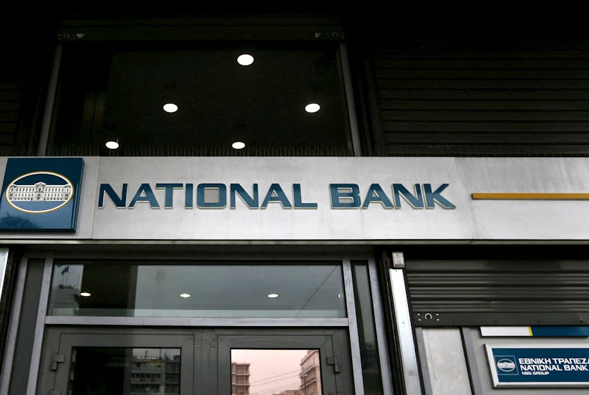 The logo of National Bank is seen outside a branch in Athens March 23, 2015.