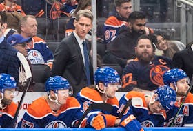 Edmonton Oilers new coach Kris Knoblauch on the bench against the New York Islanders in Edmonton on Monday, Nov. 13, 2023.