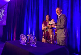 Harneet Brar, owner of House of Spice in Summerside, left, accepts an award from Claus Schmidt from CBDC. Brar's restaurant was named New Business of the Year at the 2023 Business Excellence Awards. It was also nominated for the Community Impact Award. – Kristin Gardiner/SaltWire