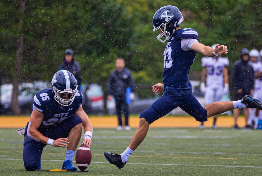 Ben Hadley of St. Francis Xavier boots one of his record-breaking 24 field goals during the 2023 Atlantic university football season. The Halifax kicker and the X-Men will face the UBC Thunderbirds in the Mitchell Bowl national semifinal football game Saturday in Vancouver. - David Cox / St. F.X. Athletics