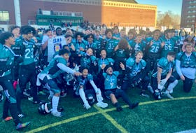 The Auburn Drive Eagles celebrate their second Nova Scotia High School Football League championship in three years after defeating the Bay View Sharks 31-6 in the final Sunday afternoon at Huskies Stadium. - Glenn MacDonald / The Chronicle Herald