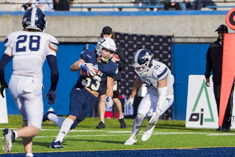 UBC receiver Dane Kapler scores a touchdown against St. Francis Xavier in the first quarter of the Mitchell Bowl national semifinal Saturday in Vancouver. The Thunderbirds defeated the X-Men 46-17 and advances to the Vanier Cup next weekend. - Bob Frid / UBC Athletics