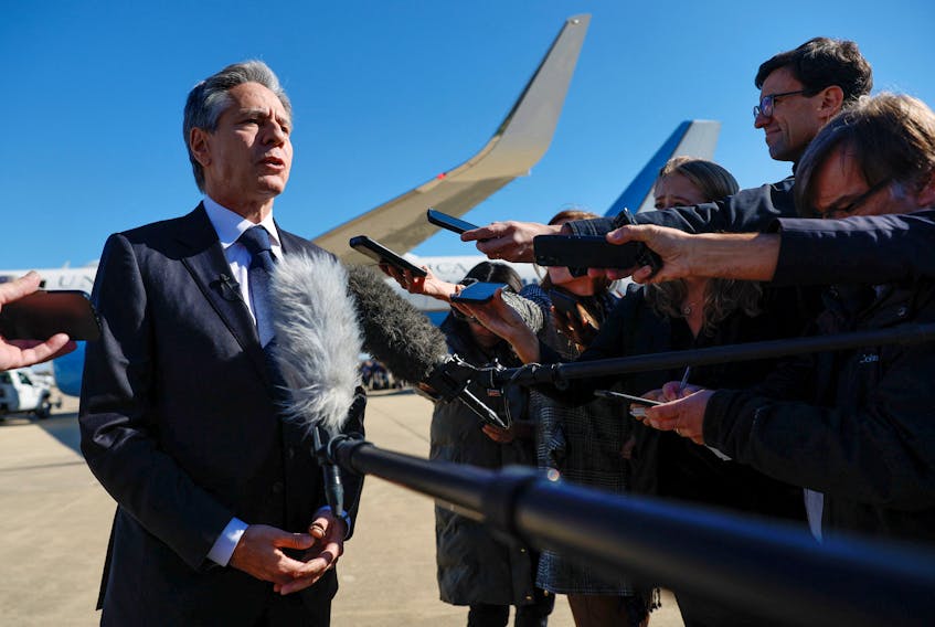 U.S. Secretary of State Antony Blinken speaks to reporters about the war between Israel and Hamas and the situation in Gaza before boarding his aircraft to depart Washington on diplomatic travel to the Middle East and Asia at Joint Base Andrews, Maryland, U.S., November 2, 2023.