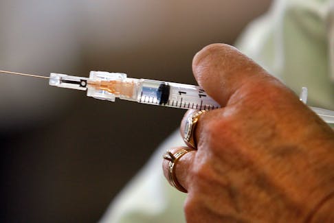 FOR NEWS ONLY

Oct. 19, 2011--Photo of a nurse preparing a dose of flu vaccine at the Northwood Centre Wednesday.