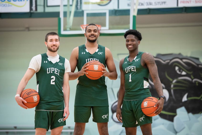 UPEI Panthers, from left, Sam Chisholm, Abilash Surendran and Kamari Scott, are ready for the team’s home opener in the 2023-24 Atlantic University Sport (AUS) Men’s Basketball Conference on Nov. 3. The UPEI men’s and women’s teams will host St. Francis Xavier at the Chi-Wan Young Sports Centre. The women’s game begins at 6 p.m., and the men tip off at 8 p.m. UPEI Photo • Special to The Guardian