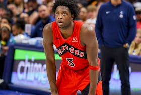 Toronto Raptors forward O.G. Anunoby (3) looks to the basket during a free throw during the second half of an NBA basketball game against the Dallas Mavericks, Wednesday, Nov. 8, 2023, in Dallas 