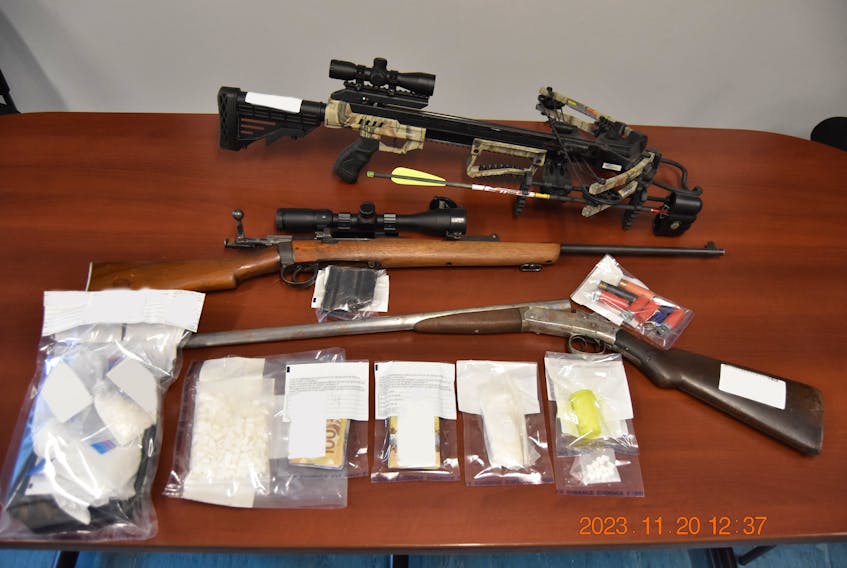 Annapolis District RCMP seized some drugs, cash, firearms and ammunition during a home search on Friday, Nov. 17. - Contributed