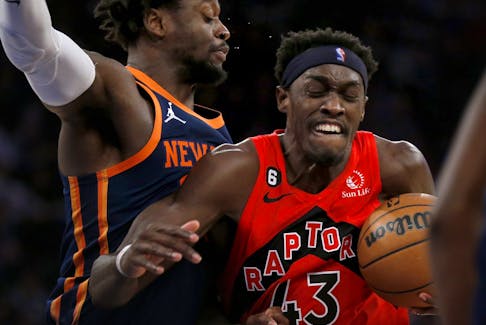 Toronto Raptors forward Pascal Siakam drives past New York Knicks forward Julius Randle, left, during the first half of an NBA basketball game Wednesday, Dec. 21, 2022, in New York. 