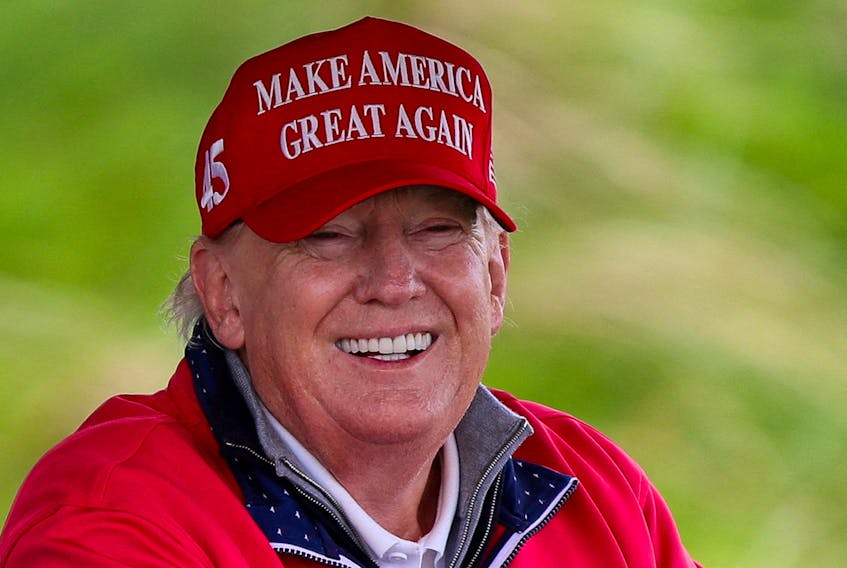 Former U.S. President and Republican presidential candidate Donald Trump reacts as he visits Trump International Golf Links course, in Doonbeg, Ireland May 4, 2023.