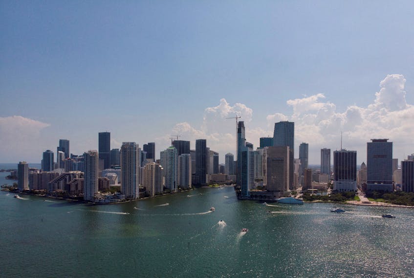 The Miami River flows into Biscayne Bay between Brickell neighborhood and Downtown, in Miami, Florida, U.S. June 18, 2022. Picture taken with a drone.