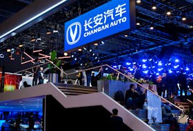 People visit the Changan Automobile booth during a media day for the Auto Shanghai show in Shanghai, China April 19, 2021.