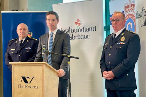 RCMP-NL Chief Superintendent Pat Cahill (left), provincial Justice Minister John Hogan (centre) and Royal Newfoundland Constabulary Chief Pat Roche speak to members of the media at the announcement of the province's Policing Transformation Initiative at The Rooms in St. John's Nov. 20, 2023.