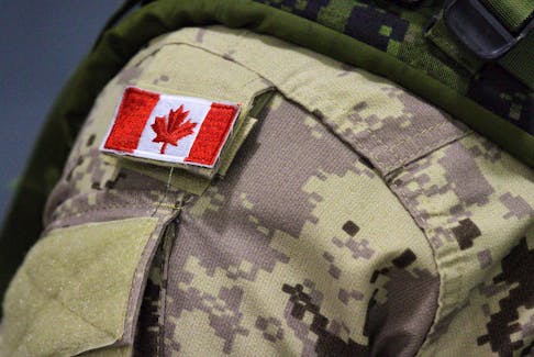 A Canadian flag patch is shown on a soldier's shoulder in Trenton, Ont