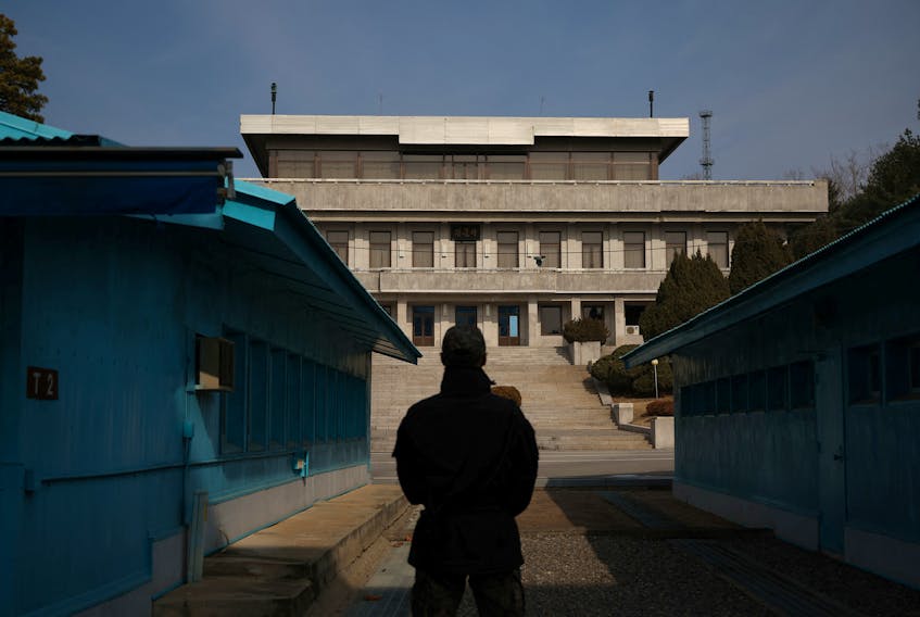 A South Korean soldier stands guard in the truce village of Panmunjom inside the demilitarized zone (DMZ) separating the two Koreas, South Korea, February 7, 2023.  