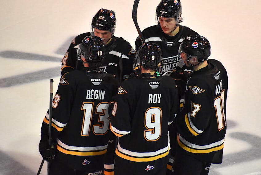 Members of the Cape Breton Eagles gather prior to the start of a period during Quebec Major Junior Hockey League action at Centre 200 in Sydney on Saturday. Cape Breton will host two of the top teams in Canada this week in the Halifax Mooseheads and Baie-Comeau Drakkar. Front row, from left, are Thomas Begin, Antoine Roy and Xavier Daigle. Back row, from left, are Olivier Houde and Tomas Lavoie. JEREMY FRASER/CAPE BRETON POST