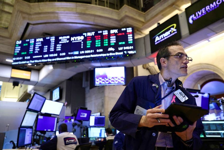 A trader works on the trading floor at the New York Stock Exchange (NYSE) in New York City, U.S., January 27, 2023.