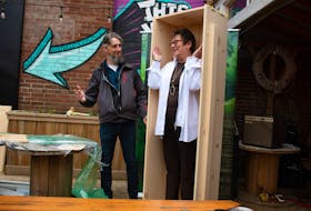 Louisa Horne, founder of Epilog, an environmentally-friendly burial service company, stands inside a newly constructed casket put together by Jeremy Burrill from the Fiddlehead Casket Company during a presentation at the Oxford Taproom patio on Wednesday, Nov. 22, 2023.
Ryan Taplin - The Chronicle Herald
