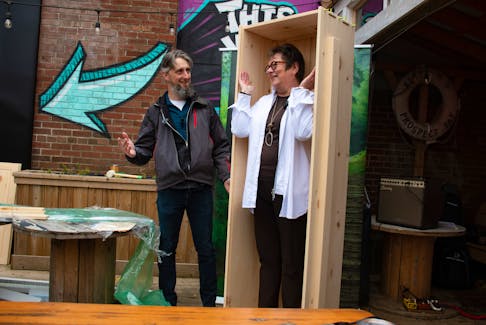 Louisa Horne, founder of Epilog, an environmentally-friendly burial service company, stands inside a newly constructed casket put together by Jeremy Burrill from the Fiddlehead Casket Company during a presentation at the Oxford Taproom patio on Wednesday, Nov. 22, 2023.
Ryan Taplin - The Chronicle Herald