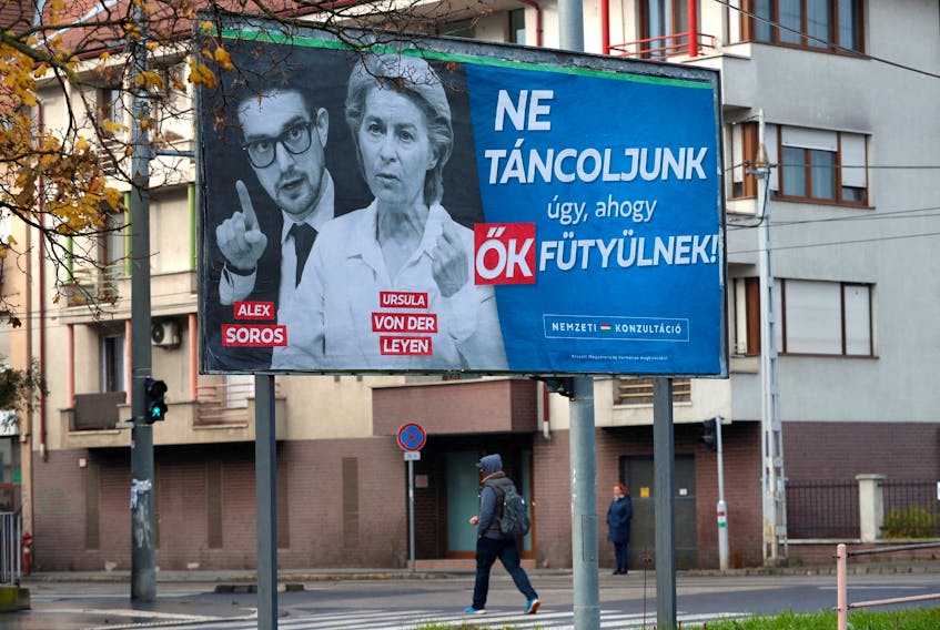 A government billboard shows American philanthropist Alex Soros, son of Hungarian-American financier George Soros and European Commission President Ursula von der Leyen in Budapest, Hungary, November 20, 2023. The billboard reads, "Let's not dance to their tunes".