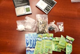 Police arrested and charged six people with drug trafficking after seizing cocaine, magic mushrooms, methamphetamine, scales, cash and cell phones during a home search in North Kentville on Nov. 10. - Contributed