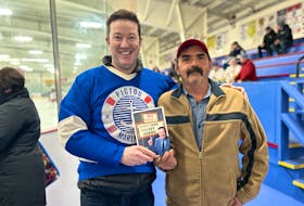 Ken Reid and Dana "T-Pot" Johnston at the Hector Area on Nov. 18 during the book signing for Reid's new book, Ken Reid's Hometown Hockey Heroes. A large crowd gathered to meet Ken and catch up with Johnston, swapping stories and sharing laughs while taking in the Northern AAA Subway Selects game happening on the ice. Sarah Jordan