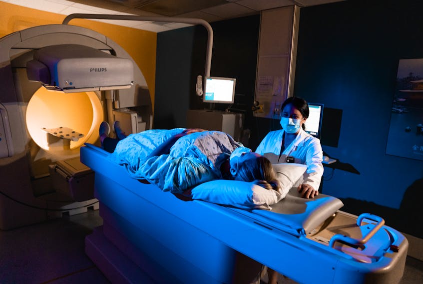 A patient undergoes a scan in one of the QEII’s current nuclear medicine scanners. The scanners perform 4,000 patient scans annually.