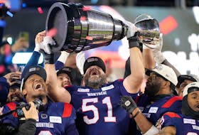 Montreal Alouettes' Avery Williams, left, Kristian Matte (51) and Darnell Sankey celebrate after defeating the Winnipeg Blue Bombers in the 110th Grey Cup in Hamilton on Sunday night. John E. Sokolowski • USA TODAY Sports