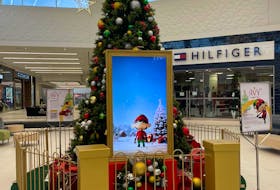 The VOCM Cares Happy Tree has a new campaign face: Avy the Elf. Happy, the iconic decade-old talking Christmas tree, is retired. Photo courtesy of Avalon Mall