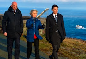 European Commission President Ursula von der Leyen admires the scenery from Signal Hill in St. John’s Friday afternoon as Prime Minister Justin Trudeau (right) and European Council President Charles Michel stroll with her. The trio were visiting the national historic site at the end of the Canada-European Union summit being held in the capital city Thursday and Friday. The Bell Island ferry Legionnaire sails past in the background after leaving St. John’s harbour. Keith Gosse • The Telegram