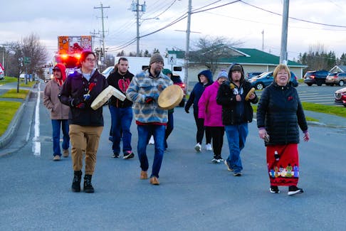 From left, Ryan Gould, Jeff Ward, Oonig Paul-Ward and Yvonne Meunier lead a march through the streets of Membertou First Nation as part of the annual Membertou Drug and Alcohol Awareness Week. This year’s theme for the week of drug and alcohol awareness and education is “Change begins with me,” representing the internal battle of addiction and the personal decisions associated with sobriety. Throughout the week, events include naloxone training, a march and testimony from community members who have dealt with drug or alcohol addiction. MITCHELL FERGUSON/LOCAL JOURNALISM INITIATIVE REPORTER, CAPE BRETON POST