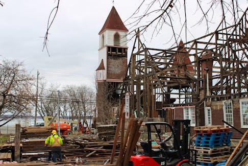 St. Matthew Wesley United Church undergoing deconstruction in North Sydney on Nov. 22. Work began on removing materials from the structure in September, although the church has been closed since late 2021. The church has stood in central North Sydney since 1901. LUKE DYMENT/CAPE BRETON POST