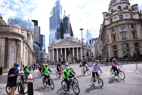 Cyclists ride through Bank in London's financial district as they participate in the RideLondon FreeCycle event, in London, Britain, May 29, 2022.