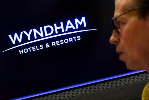 A screen displays the logo for Wyndham Hotels & Resorts, Inc. at the New York Stock Exchange (NYSE) in New York City, U.S., June 5, 2023. 