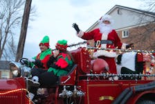 Santa Claus himself arrived to the Truro's Santa Claus parade on Nov. 26 in Nancy, the Truro Fire Brigade's century-old firetruck. Pedestrians excitedly screamed and shouted as he waved to the crowd. Brendyn Creamer